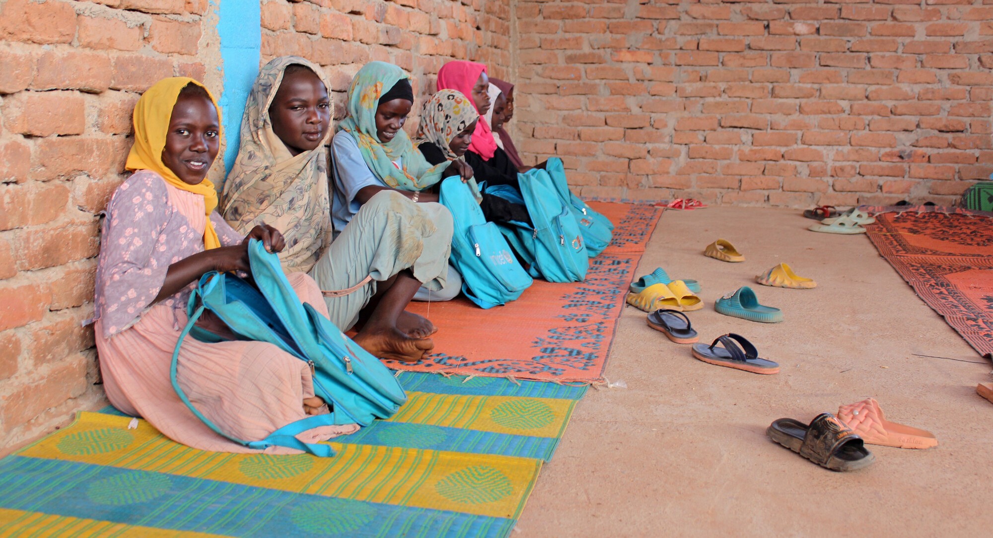 Girls learning at school in Aboutengue camp  