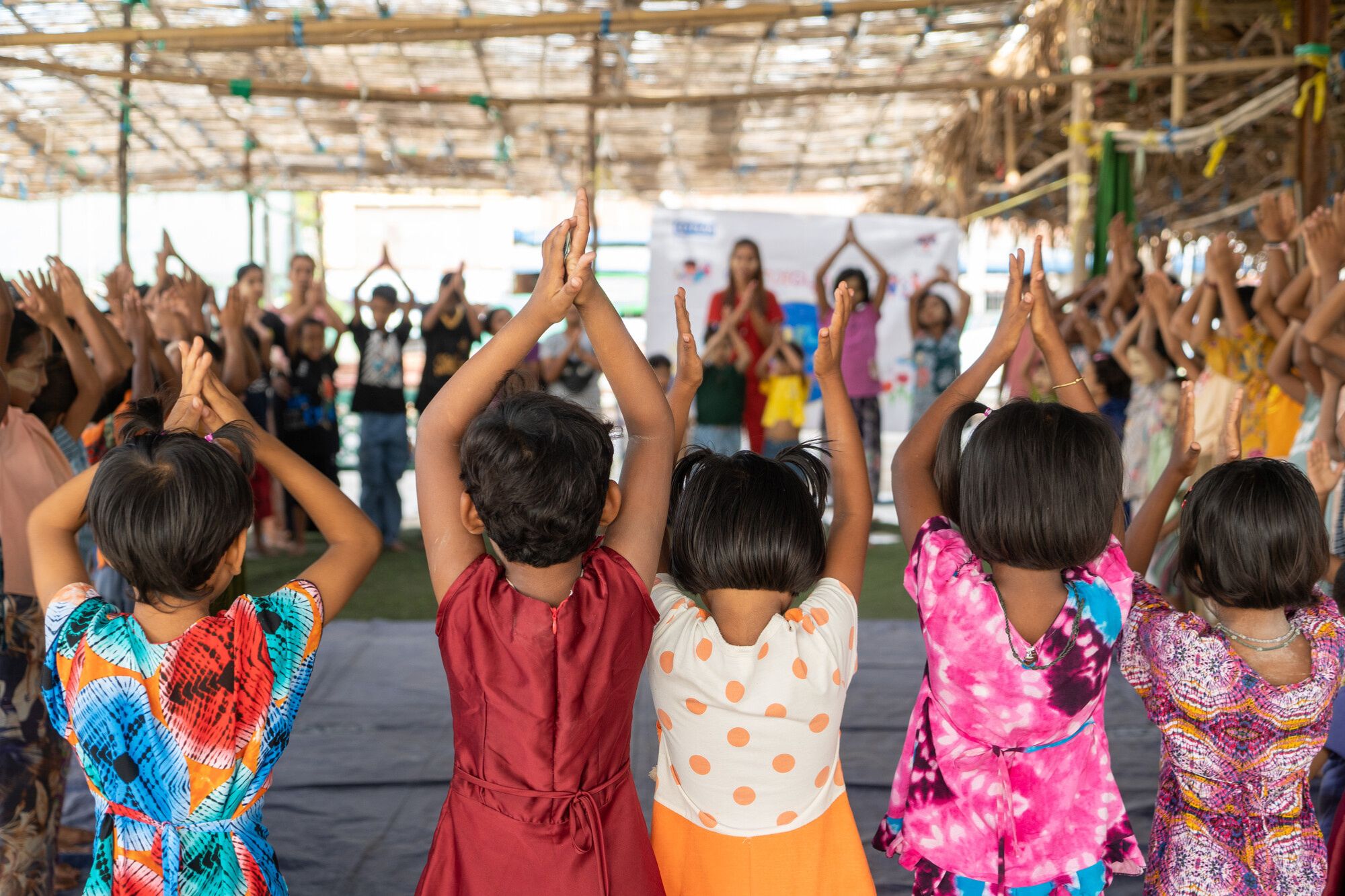 Children take part in group activity at child friendly space in Mandalay  